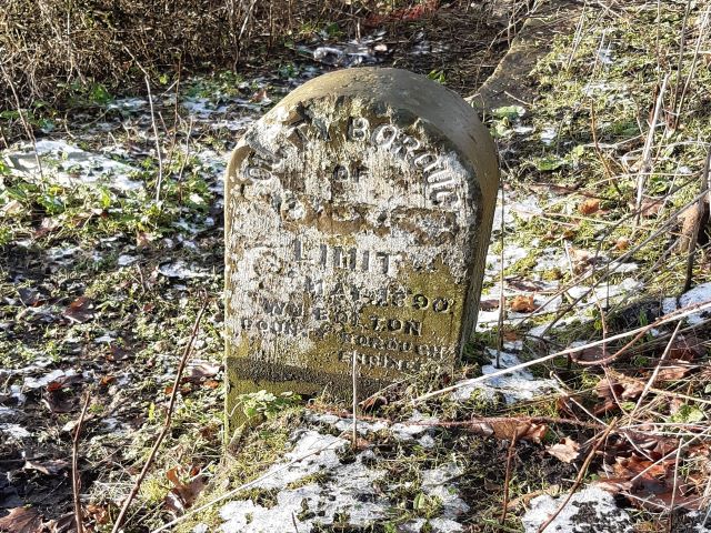 Boundary Stone on the Leeds Liverpool Canal towpath near Martland Mill Bridge